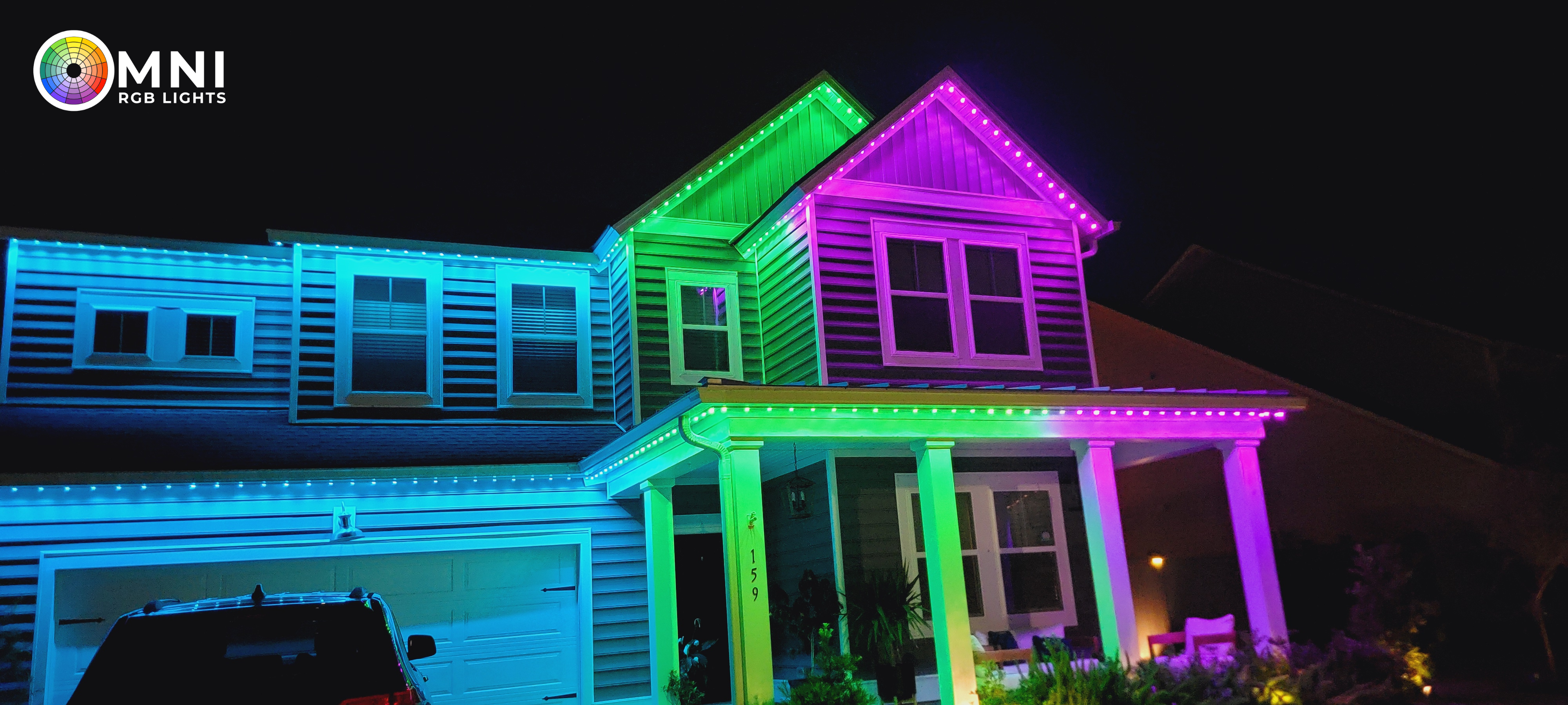 Architectural outdoor lighting highlighting a home's peaks